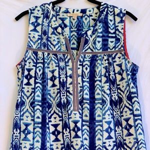 Split V-neck Sleeveless Top by Skies are Blue